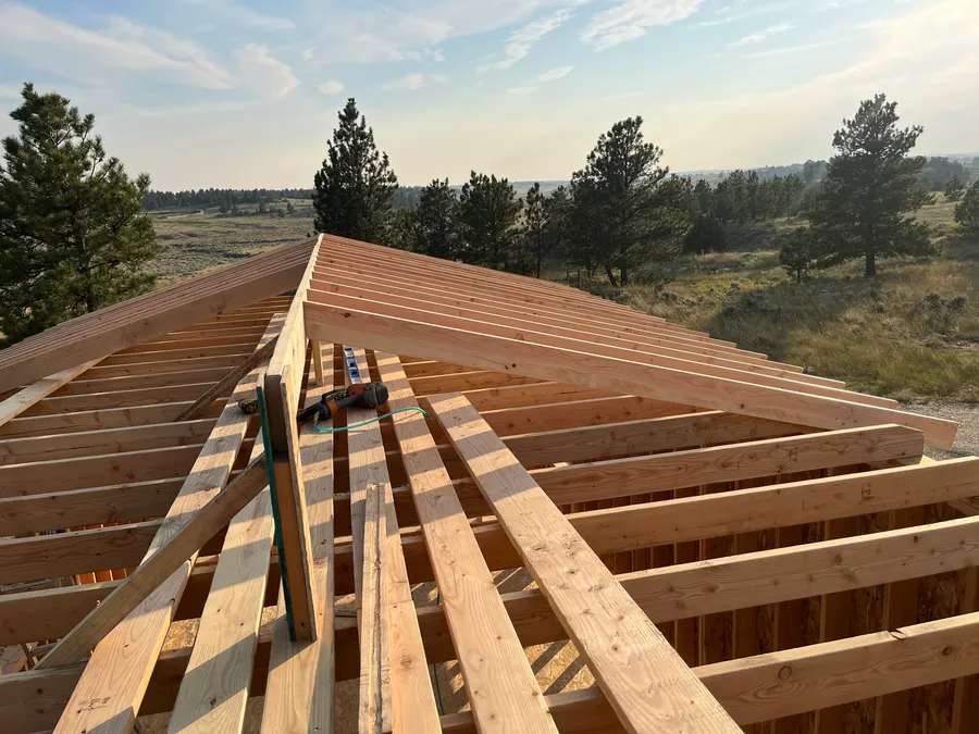 Roof framing on a custom home overlooking the Montana landscape